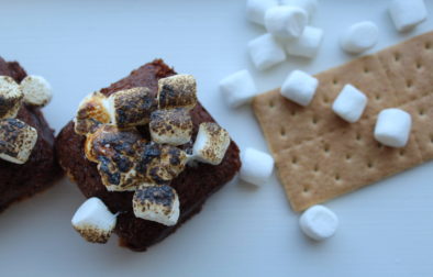 s'more brownies with a graham cracker and marshmallows