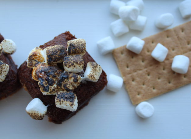 s'more brownies with a graham cracker and marshmallows