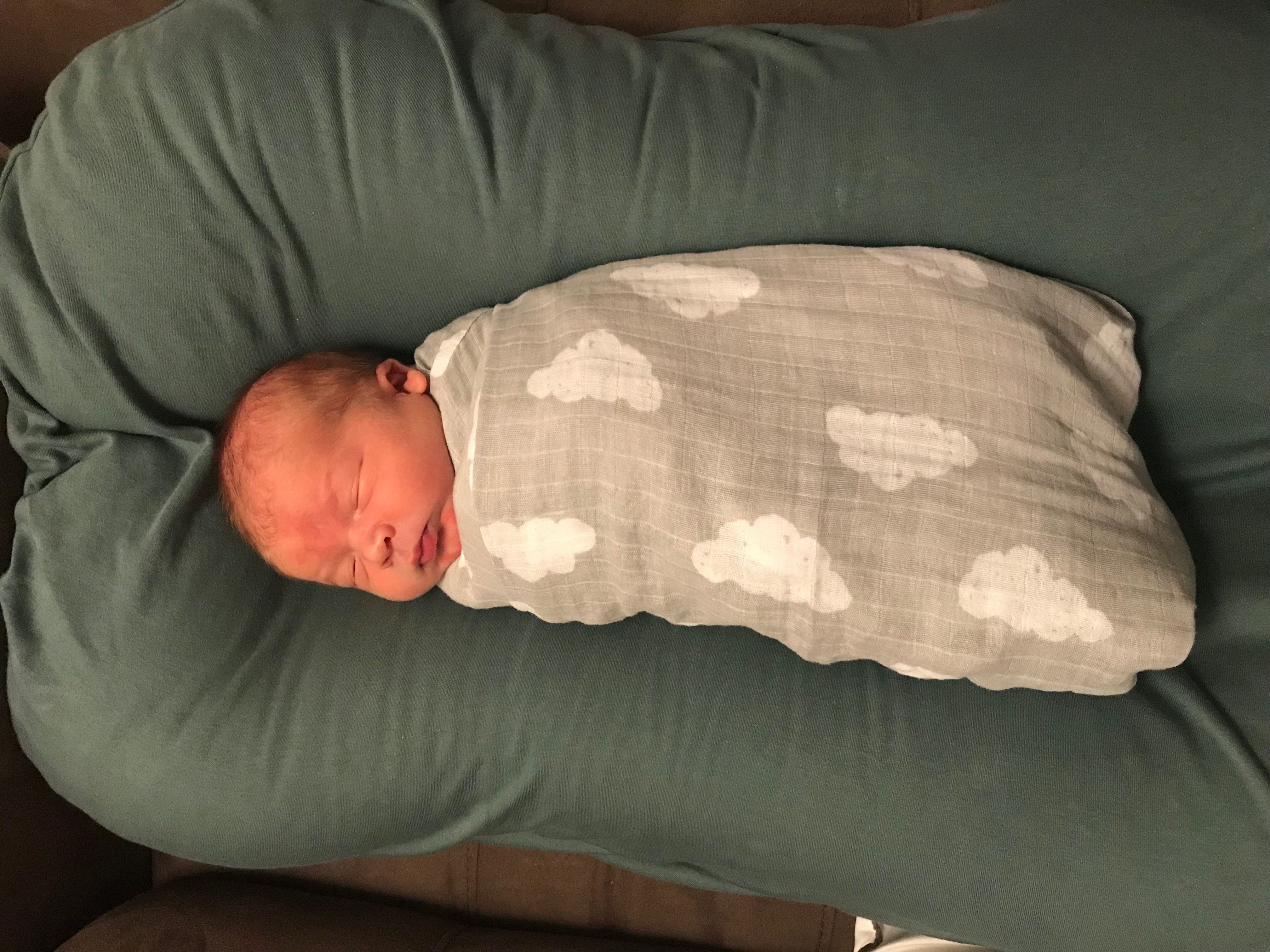 baby owen in swaddle