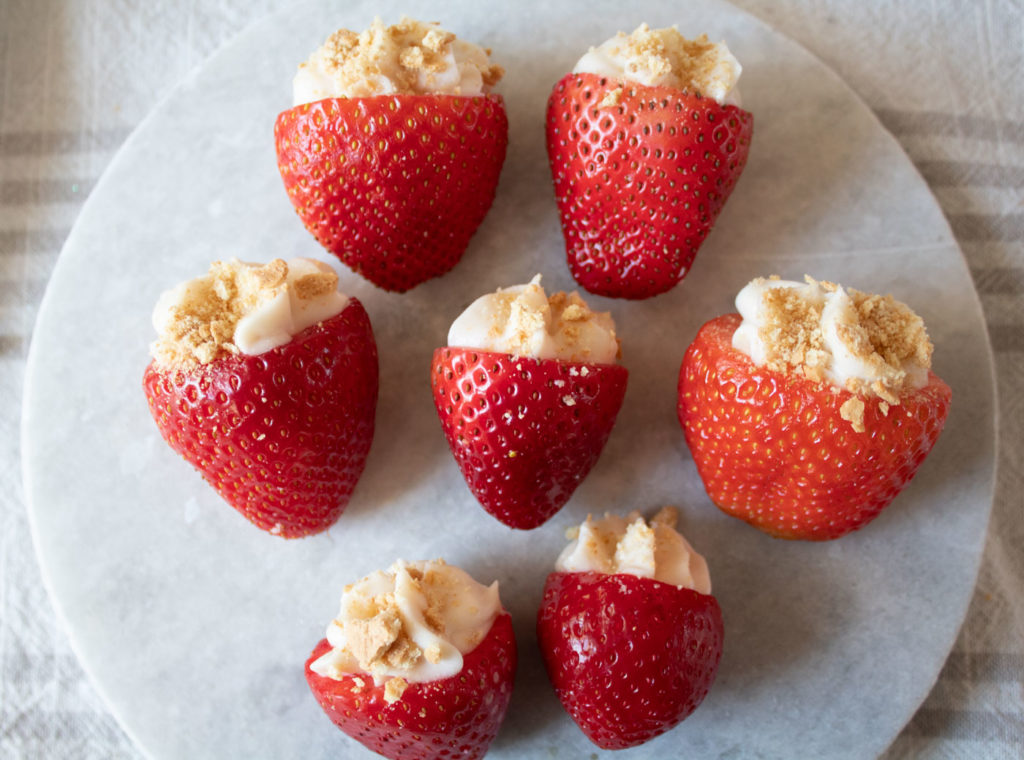 7 strawberry cheesecake bites on plate