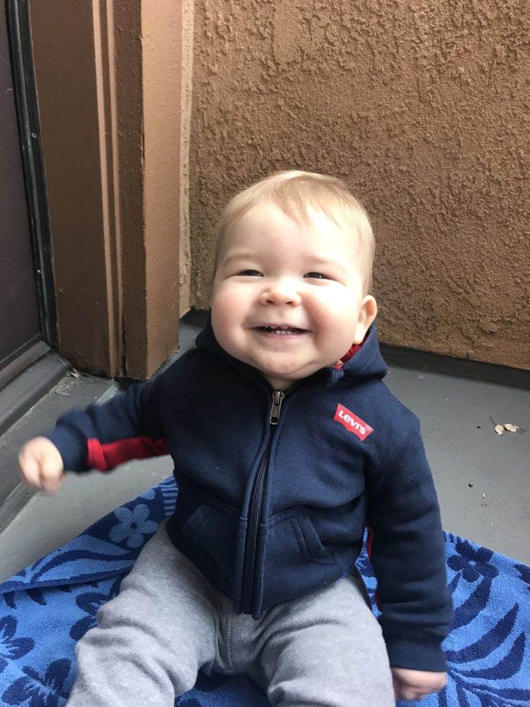 Owen sitting on the porch